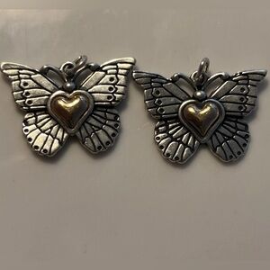 Matching silver and gold butterfly pendants
